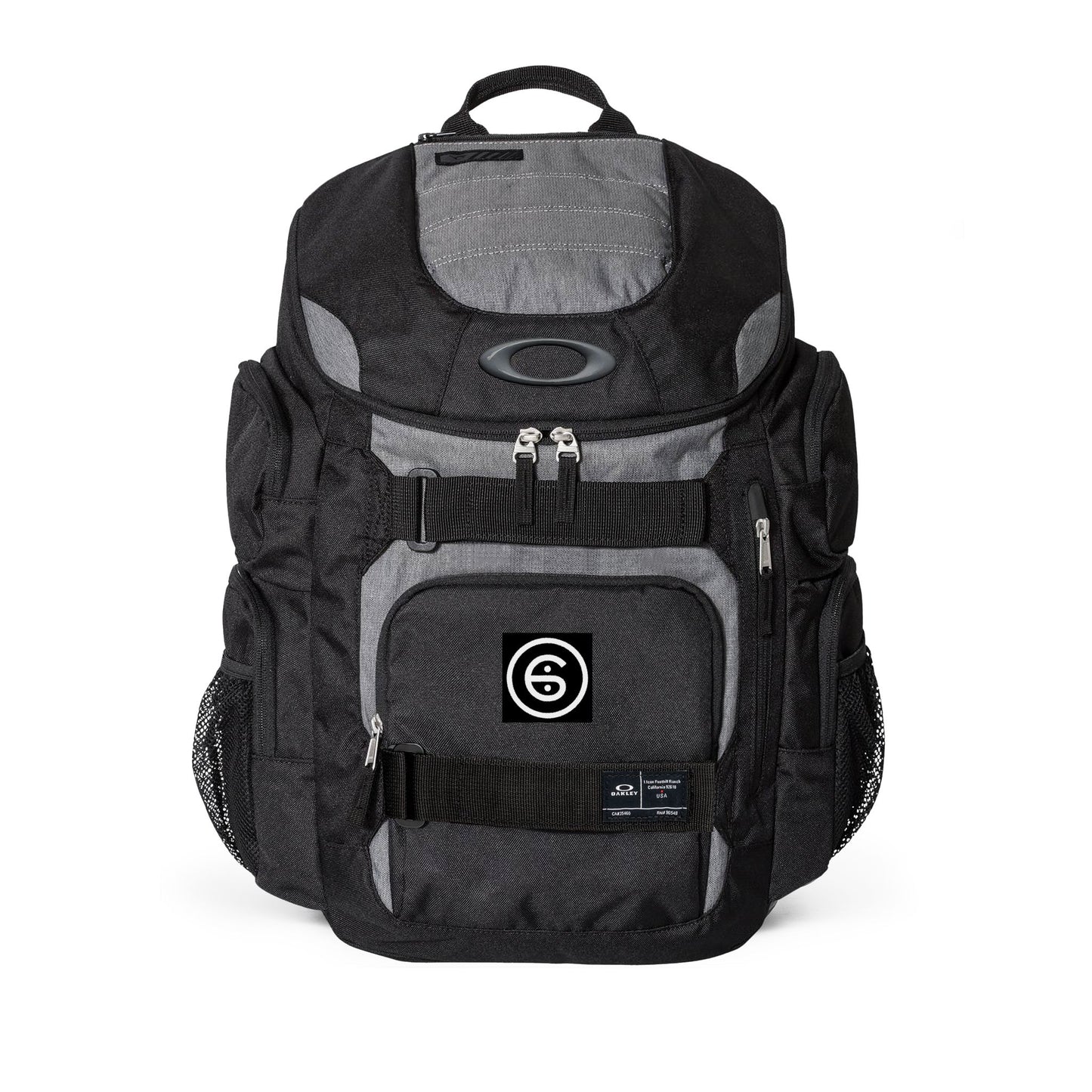Add Your Own Logo Or Flag to an Oakley 30L BackPack. Forged Iron or Black out Colours. Oakley Personalization options.